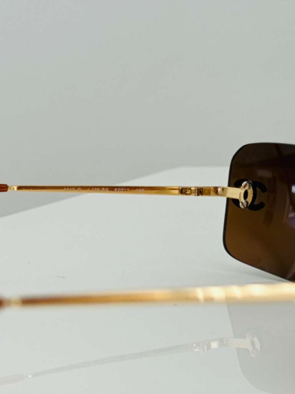 CHANEL Brown Rimless Sunglasses with Gold CC Accents - Picture 13 of 14
